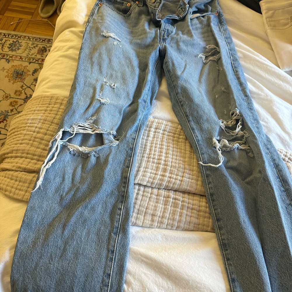 Distressed Blue Denim Jeans
